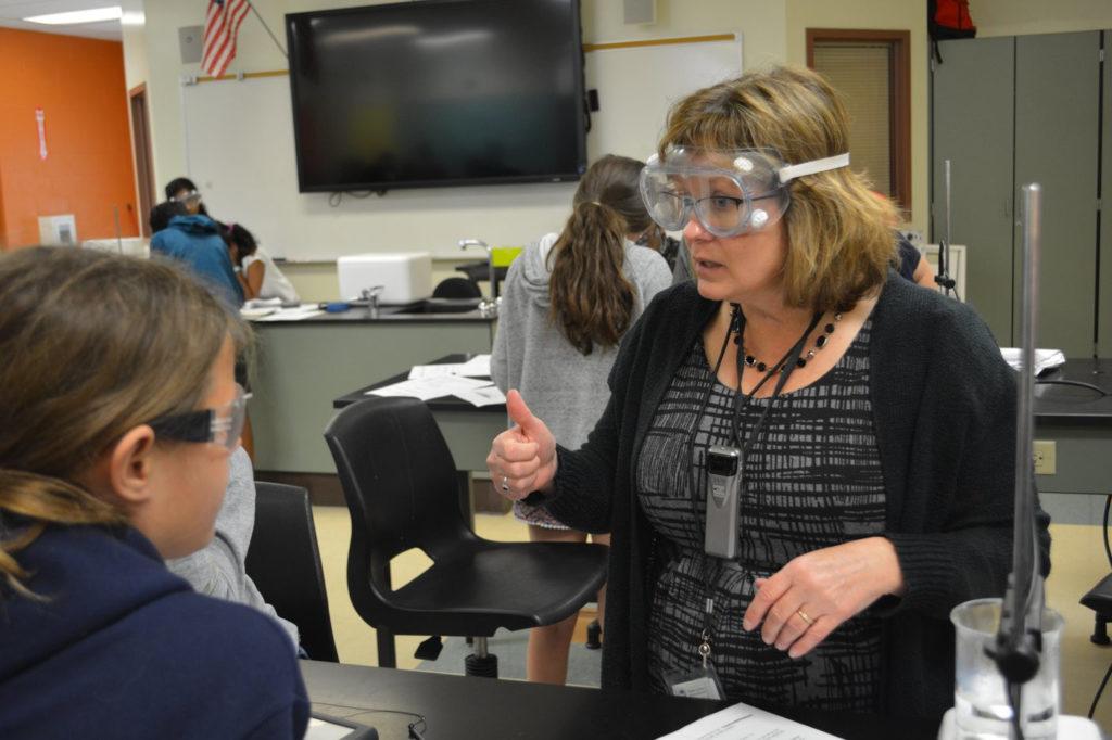 Mrs. Brown work with students