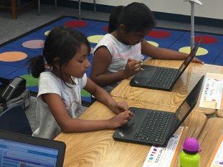 2 academy students working together
