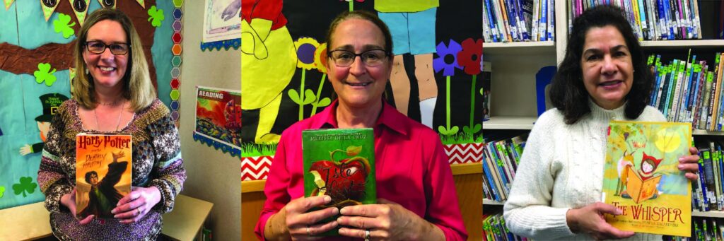 teachers with library books 