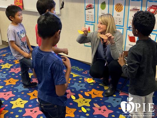 teacher teaching kids