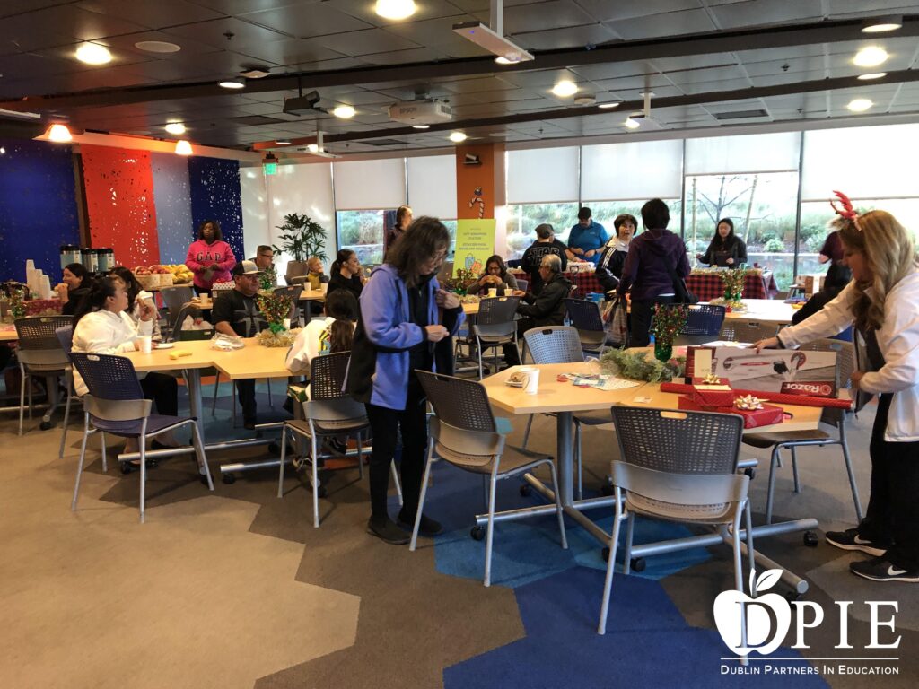 Volunteers wrapping presents at the Holiday Pop Up Shop EDCC